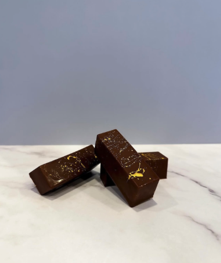 Dubai Chocolate — Dense chocolate base with toasted kunafa and pistachio filling
